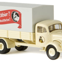 1950s Mercedes-Benz L 311 Low-Side Delivery Truck - Assembled -- With Tarp Cover, Schultheiss Bockbier (ivory, red, German Lettering)