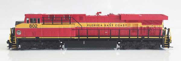 GE ES44C4 - Standard DC -- Florida East Coast 812 (red, yellow, black)