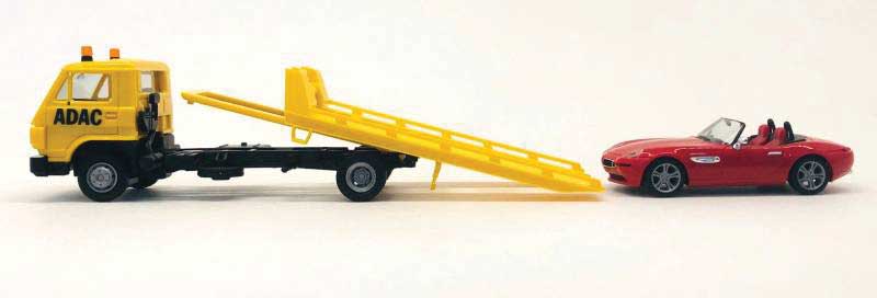 Flatbed Tow Truck with BMW Convertible Load - Assembled -- ADAC (yellow, black)