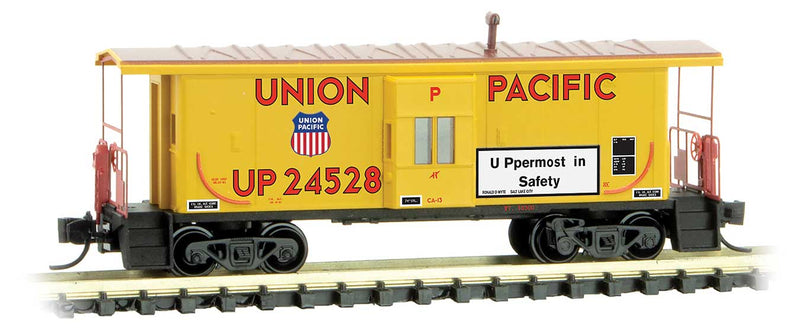 Steel Bay Window Caboose - Ready to Run -- Union Pacific 24528 (Armour Yellow, red, Uppermost in Safety Slogan)