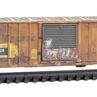 50' Rib-Side Single-Door Boxcar No Roofwalk - Ready to Run -- Montana Rail Link #21408 (Ex-Railbox, yellow, black, graffiti, Series #3)