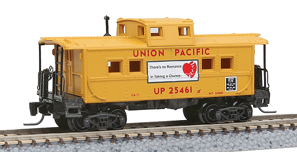 Steel Center Cupola Caboose - Ready to Run -- Union Pacifc #25461 (yellow, red w/"No Romance in Taking a Chance" Slogan)