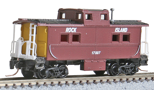 Steel Center-Cupola Caboose - Ready to Run -- Rock Island #17707 (oxide, yellow ends, black roof)