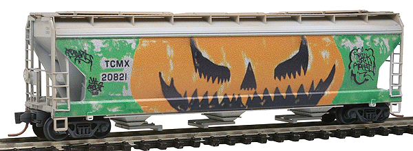 ACF 3-Bay Center Flow Covered Hopper w/Elongated Hatches - Ready to Run -- TCMX #20821 (Weathered, gray, Jack O'Lantern Graffiti On One side)