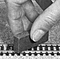 Cleaning track block