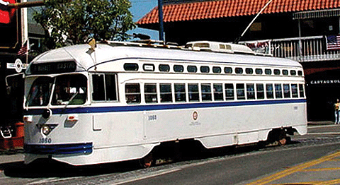 San Francisco F Line PCC Streetcar Powered -- Newark Public Service Coordinated Transport #1060 (gray, white, blue belt ra