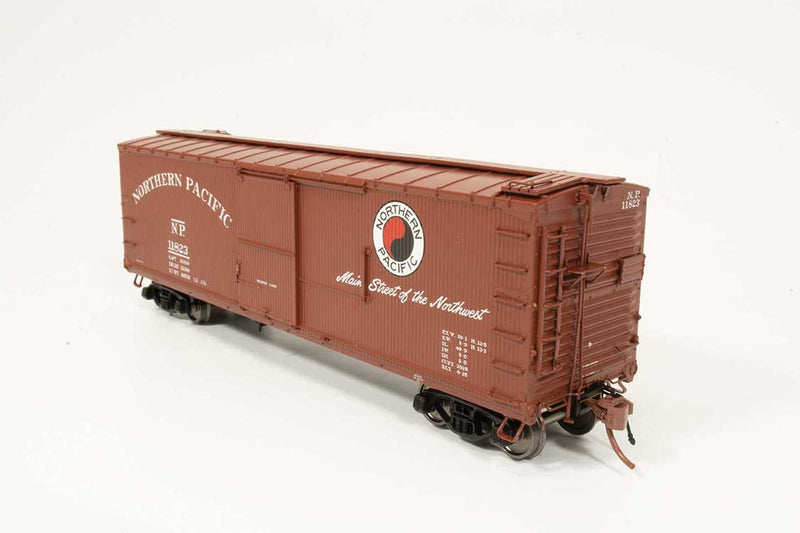 NP 10000-Series 40' Wood Boxcar 4-Pack - Ready To Run -- Northern Pacific (1950, Boxcar Red, Main Street Slogan, Large Monad)-1