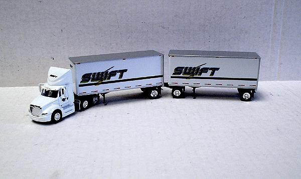 Semi Truck Prostar Day Cab w/28' Double Van Trailers - Assembled -- Swift Transportation (white, blue)