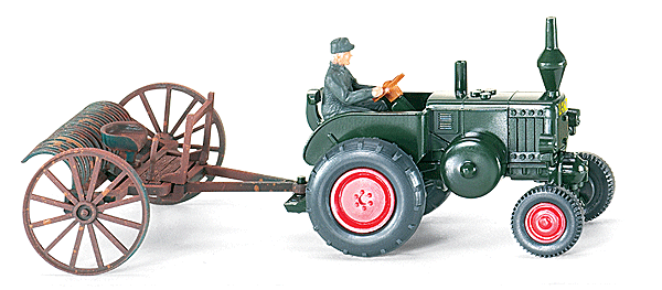 Farm Equipment -- Rake with Tractor