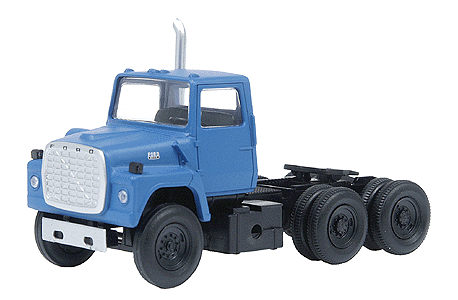 American Trucks; Ford(R) 1984 9000 LNT 3-Axle Conventional Semi Tractor -- Medium Blue
