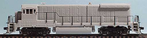 Diesel GE B23-7 w/Low Nose - Powered -- Undecorated (Thin Anticlimber, Buttons Btry Box, Blomberg Trks, Flat Hdlght)