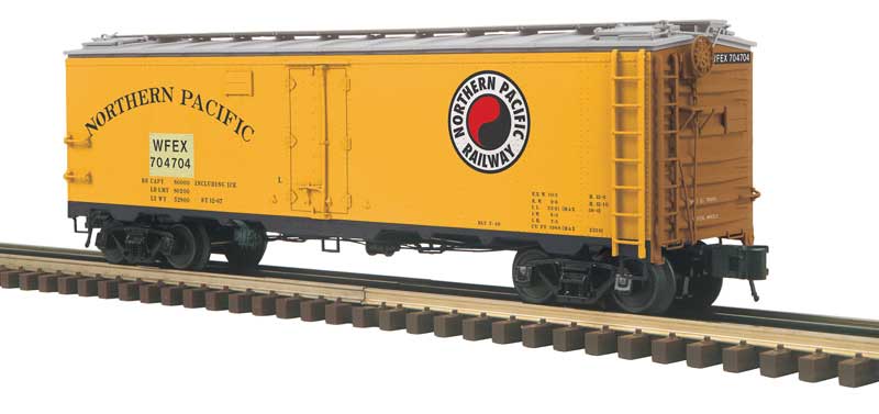 40' Steel Reefer - 3-Rail - Ready to Run - Master -- Northern Pacific WFEX (Patched, yellow, silver, Boxcar Red, Monad)