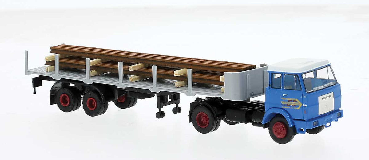 Henschel F221S Tractor with Stake Flatbed Trailer & Pipe Load - Assembled -- G&G (blue, gray)