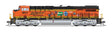 GE ES44AC GEVO - Standard DC - Stealth -- BNSF Railway #6022 (25th Anniversary Scheme, orange, black, yellow)-1
