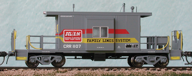 Short Body Bay Window Caboose - Ready to Run -- Family Lines System/Clinchfield #1107 (gray, red, yellow)