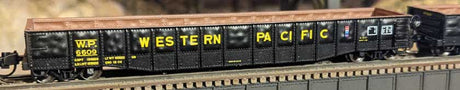 52'6" 15-Panel Mill Gondola - Medium Dented Sides - Ready to Run -- Western Pacific #6609 (black, yellow)