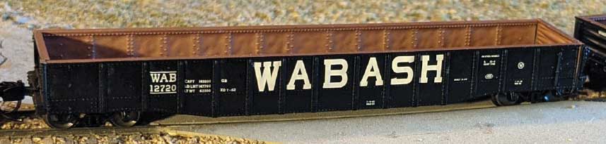 52'6" 15-Panel Mill Gondola - Medium Dented Sides - Ready to Run -- Wabash # 12720 (black, white)