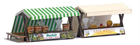 Two Outdoor Market Stalls - Laser-Cut Kit -- Cucumber & Cheese (German Signs), 2 Unpainted Figures, Tables/Benches, Scale
