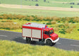 Unimog U 5023 Fire Truck w/Working Lights - Assembled -- Fire Department (red, white, German Letering)