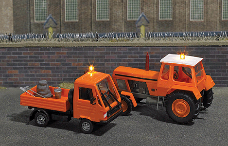 Unimog U 430 Heavy-Duty Truck - Lighted - Assembled -- Street Maintenance (orange, German Lettering)-1