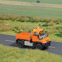 Unimog U 430 Heavy-Duty Truck - Lighted - Assembled -- Street Maintenance (orange, German Lettering)