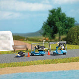 Penguins Ridomg Scooters Complete Miniature Scene -- 3 Penguins, 2 Scooters, Skateboard, 4 Traffic Cones, Barricades-2