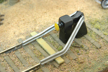 End-of-Track Bumper -- Unpainted Metal Castings