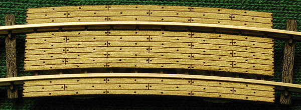 Grade Crossing pkg(2) -- 9-3/4" Radius Curve - Fits Code 100 Rail