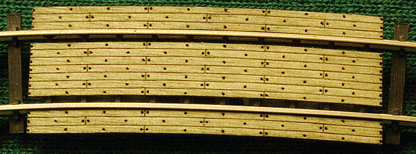 Grade Crossing pkg(2) -- 15" Radius Curve - Fits Code 100 Rail