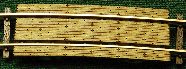 Grade Crossing pkg(2) -- 19" Radius Curve - Fits Code 100 Rail