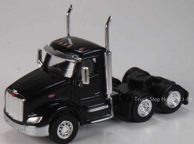 Peterbilt 579 3-Axle Day-Cab Tractor Only 2 Pack - Assembled -- Black