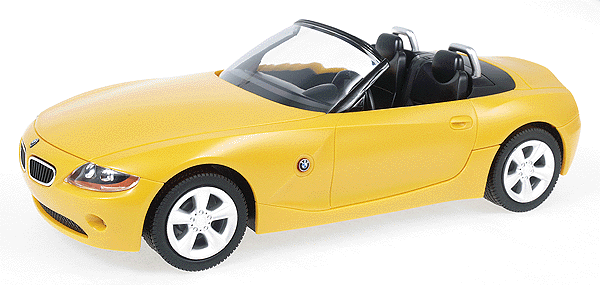 Playcar with 2 Playmobile Figures -- Yellow/Orange