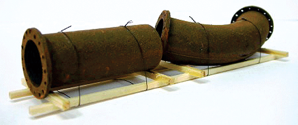 2 Rusty Flanged Pipes Load