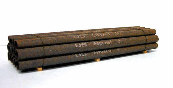 14-Pipe Stack Load -- US Steel (rusty black) 34' Scale