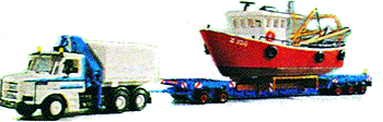 Scania lowboy w/boat load