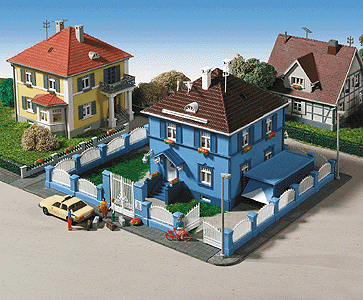 House w/Ornate Fence & 1-Car Garage -- (blue, white) 6 x 4-3/8 x 5-5/8"  15 x 11 x 14cm