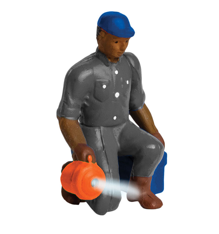 Man with Flashlight Lighted Figure