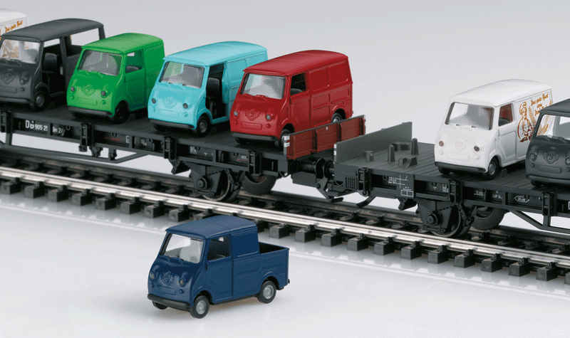 Type SM 24 Flatcar 4-Pack w/Goggo Auto Load - 3-Rail - Marklin Exclusiv -- German Federal Railroad DB (Era III, black; 24 Assorted Goggo Vehicles)