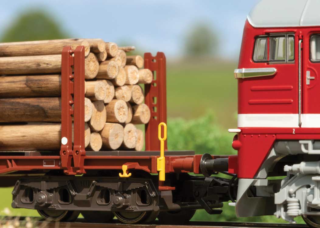 Type Snps 719 Stake Flatcar w/Log Load 5-Pack - 3-Rail - Ready to Run -- German Federal Railroad DB (Era V 1961, Boxcar Red)-2
