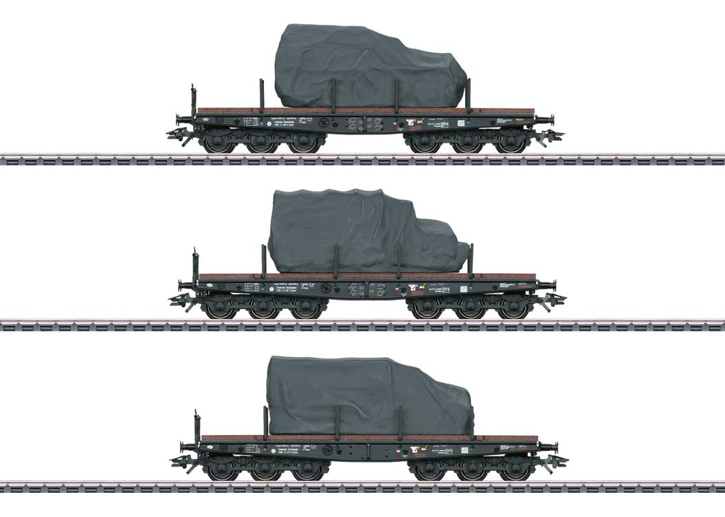 Type SSyms Koln Heavy-Duty Flatcar w/Load 3-Pack - 3-Rail - Ready to Run -- German State Railroad DR (Era II 1942, gray)-1