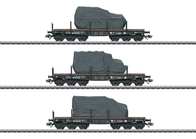 Type SSyms Koln Heavy-Duty Flatcar w/Load 3-Pack - 3-Rail - Ready to Run -- German State Railroad DR (Era II 1942, gray)-1