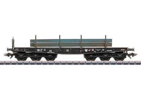 Type SSym 46 Heavy-Duty Flatcar w/Steel Billet Load - 3-Rail Ready to Run -- German Federal Railroad DB (Era III 1950s, black)
