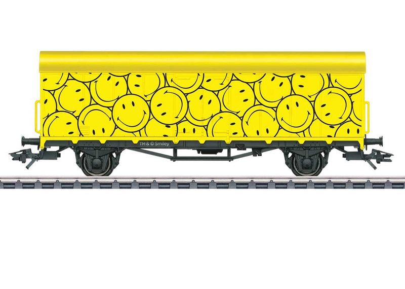 2-Axle Boxcar w/Smooth Sides - 3-Rail - Ready to Run -- 2023 Smiley Car (yellow, black, happy face graphics)-1