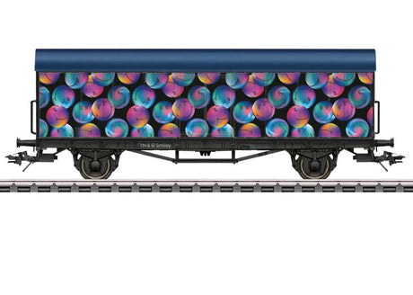 2-Axle Reefer - 3-Rail - Ready to Run -- 2025 SmileyWorld(R) Car (purple, blue, black smiley graphics)-1