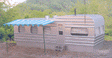 Junior's Shiner (Old Style Trailer Home)