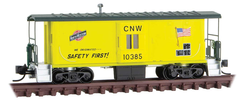 Steel Bay Window Caboose - Ready to Run -- Chicago & North Western 10385 (yellow, green, Employee Owned Logo, US Flag)