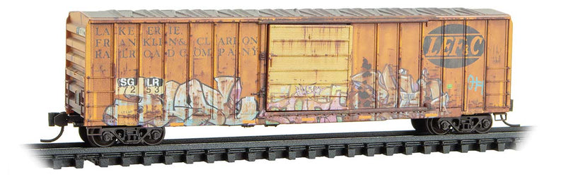 50' Rib-Side Single-Door Boxcar No Roofwalk - Ready to Run -- Seminole Gulf Railway #7253 (Weathered, Ex-LEF&C, yellow, graffiti)-1