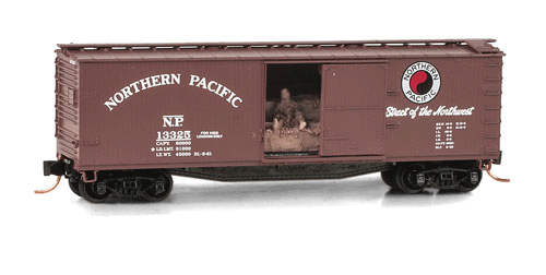 40' Double-Sheathed Single-Door Wood Boxcar w/Man on Hay Bale - Ready to Run -- Northern Pacific #13325 (Boxcar Red, red, white, Main Street Slogan)