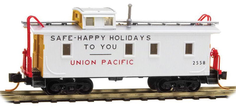 34' Wood-Sheathed Caboose w/Slanted Cupola - Ready to Run -- Union Pacific #2558 (1954 Holiday Scheme, white, yellow, Safe-Happy Holidays