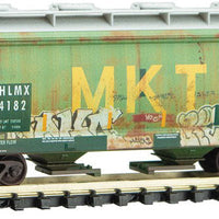 ACF 39' 2-Bay Center-Flow Covered Hopper - Round Hatches - Ready to Run -- Missouri-Kansas-Texas HLMX 4182 (Weathered, green, yellow, Graffiti)